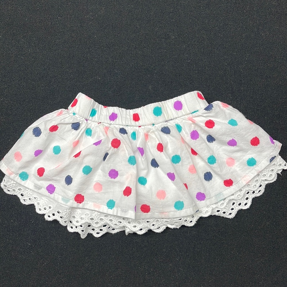 Size 6 month skirt with bloomers attached. Polka dots with eyelet lace.